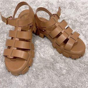 Never worn! Low platform sandals.